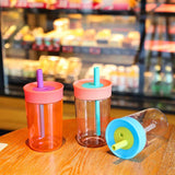 Owala Style 15oz clear plastic bottles with silicone straws_nina
